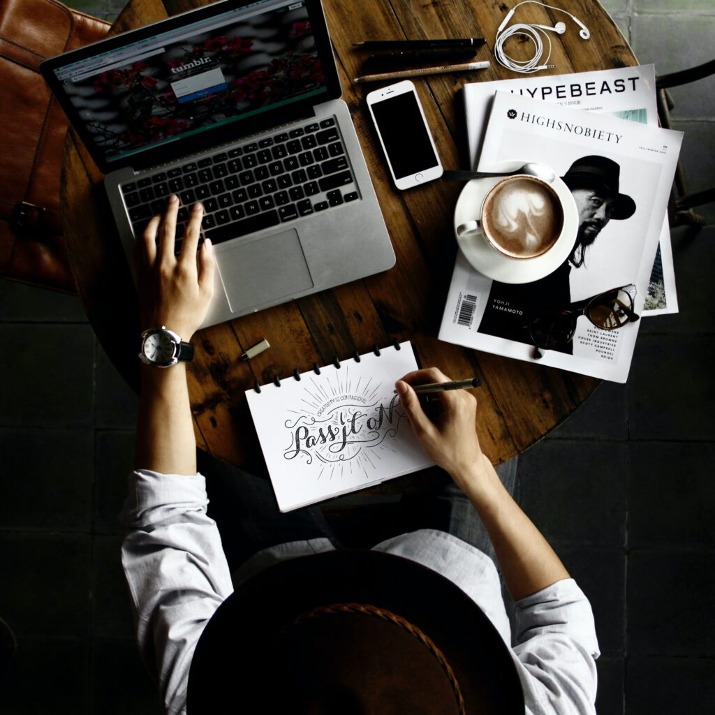 Person at a desk working on laptop