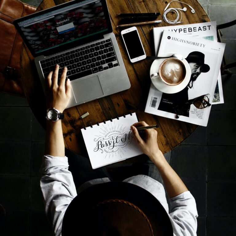 Person at a desk working on laptop